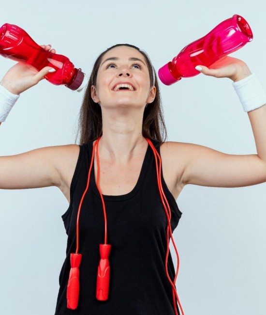 young-fitness-woman-headband-holding-bottle-water-going-dring-after-workout-standing-white-background (1) young-fitness-woman-headband-holding-bottle-water-going-dring-after-workout-standing-white-background (1)